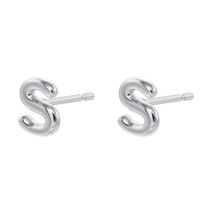 Detailed view of minimalist polished silver letter S stud earrings on a white background