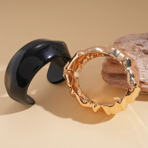 Exaggerated irregular resin and gold textured metal open bangle for minimalist fashion