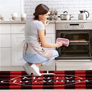 Red and black buffalo plaid Christmas kitchen runner with festive holiday greeting text