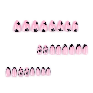 Short almond press-on nails set featuring pink base with black stars and French tip design