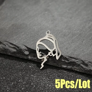 5Pcs set of silver cartoon profile silhouette pendants for ponytails on stone background