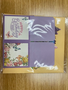 Detail of 3D pop-up flower basket birthday card with colorful butterflies and flowers
