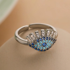 Adjustable evil eye ring with blue zircon stones in a silver-toned vintage design
