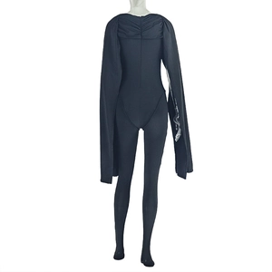 Rear view of black skin-tight jumpsuit featuring an integrated long back cape detail