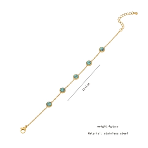Detail of golden stainless steel bracelet with green stones and length specifications