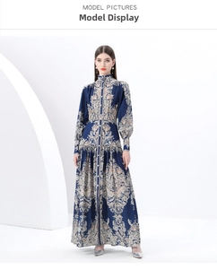 Detail of vintage navy blue paisley floral maxi dress with stand collar and puff sleeves