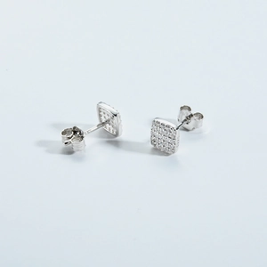 Detailed shot of S925 sterling silver stamp on square micro-pave stud earring
