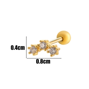 Macro shot of gold cartilage stud with three clear zircons and 0.8cm size detail