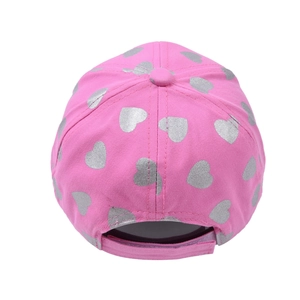 Pink kids baseball cap featuring silver heart patterns and adjustable velcro strap back