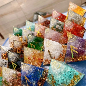 Handcrafted Orgone energy crystal pyramids with resin stones and copper spiral coils