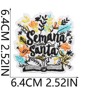 Macro detail of Semana Santa floral embroidery patch with 6.4cm size measurement indicator