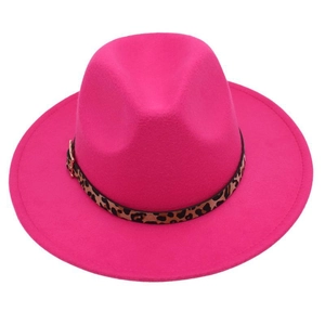 Detail of rose red fedora hat with leopard print belt buckle and smooth felt texture