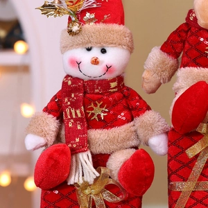 Christmas snowman plush figurine with red gift box base and sparkling sequins decoration