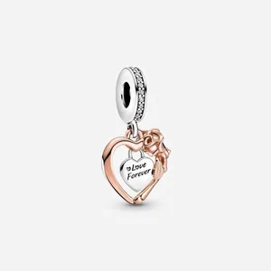 Two-tone heart charm in silver and rose gold with Love Forever engraving and roses