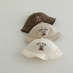 Kids bear embroidery sun hat in brown and khaki cotton fabric shown in top view