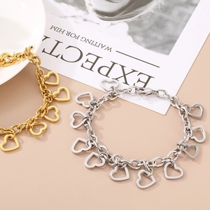18K gold and silver chunky chain bracelets featuring multiple hollow heart charms