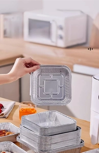 Square aluminum foil air fryer liners with reinforced edges for baking and roasting