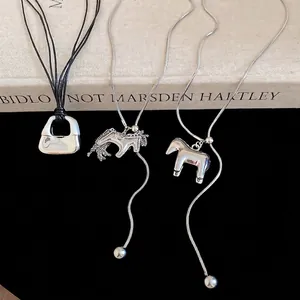 Pendant Necklace Alloy Miniature Handbag Hollow Horse Design Long Chain Black Cord Creative Minimalist Fashion For Women
