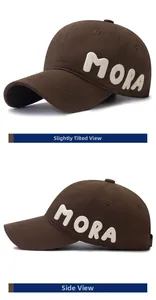 Detail view of dark brown baseball cap featuring 3D white MORA embroidery on the side