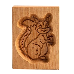 Rectangular beech wood cookie mold with detailed squirrel engraving for baking