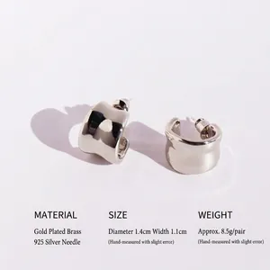 Irregular silver-tone wide C-shape hoop earrings in minimalist mirror finish brass