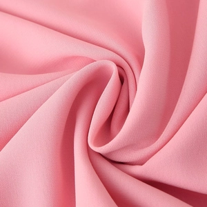 Pink bohemian chiffon top with layered ruffles and soft draped texture fabric