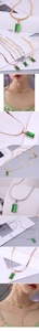 Detail of emerald green stone pendant on snake chain with gold and silver finishes