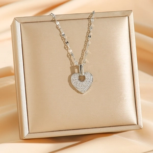 Sparkling silver heart pendant necklace with full rhinestones on luxury velvet gift box