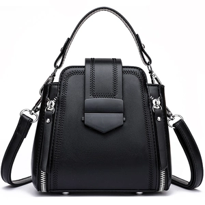 Elegant black woven texture women's handbag with silver hardware and shoulder strap