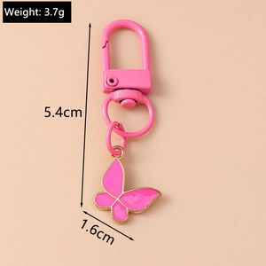 Detailed view of pink butterfly pendant keychain with metal lobster clasp and dimensions