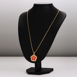 Chic gold chain necklace with a red enamel plum blossom pendant and crystals