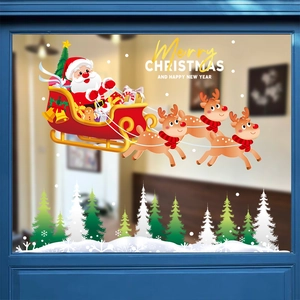 Christmas window decals with Santa, reindeer, and Merry Christmas text for glass decor