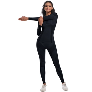 Detail showing high-elastic seamless knit texture and breathable mesh on black sports set