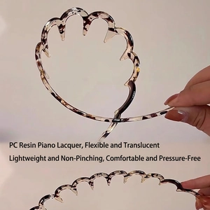 Serre-tête ondulé en résine flexible motif écaille de tortue pour un confort léger