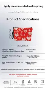 Detail of red heart pattern makeup bag showing linen texture and 17x25cm dimensions