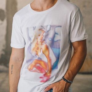 Detailed view of white cotton T-shirt featuring a colorful thermal imaging art print