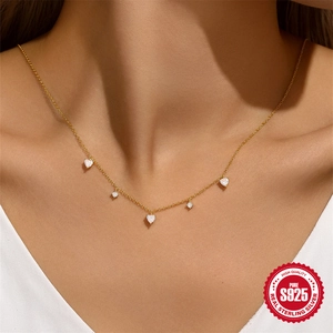 Elegant S925 sterling silver necklace with five heart-shaped cubic zirconia pendants