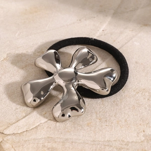 Silver flower stainless steel hair tie on stone base for stylish ponytail