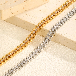Elegant gold and silver double-row bead bracelets with zircon inlays on stone slabs