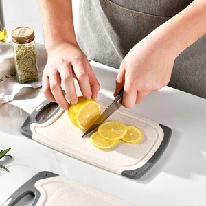 Double-sided non-slip wheat straw cutting board for kitchen with handle and gray border