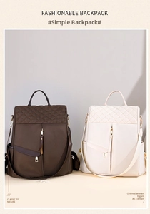 Detail of dark coffee and cream nylon backpacks with classic diamond quilted stitching