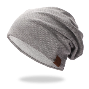 Unisex grey waffle knit slouchy beanie with brown leather F&S logo tag on white background