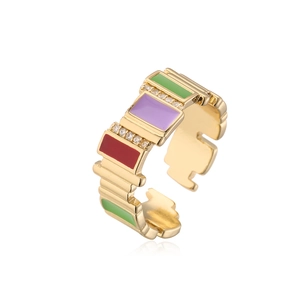 Detailed view of adjustable gold-plated ring with colorful enamel and zircon stones