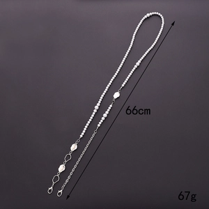 Detail showing 66cm beaded crossbody phone chain with pearls and silver metal links
