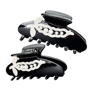 Elegant black acetate hair claw clip with inlaid pearls and sparkling rhinestones