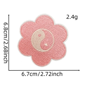 Detail of flower embroidery patch with Yin Yang pattern and dimensions 6.8x6.7cm