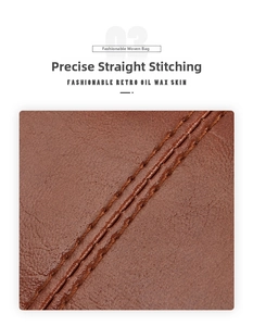 Close-up of brown oiled leather bag with three parallel high-quality stitching lines