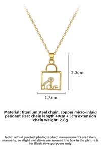Detail of gold titanium steel necklace with LOVE handbag pendant and zircon key charm