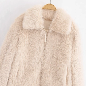 Fashionable faux fur coat in apricot with a classic lapel and smooth front zipper