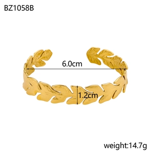 Elegant gold-plated stainless steel leaf open bangle with intricate vine texture design